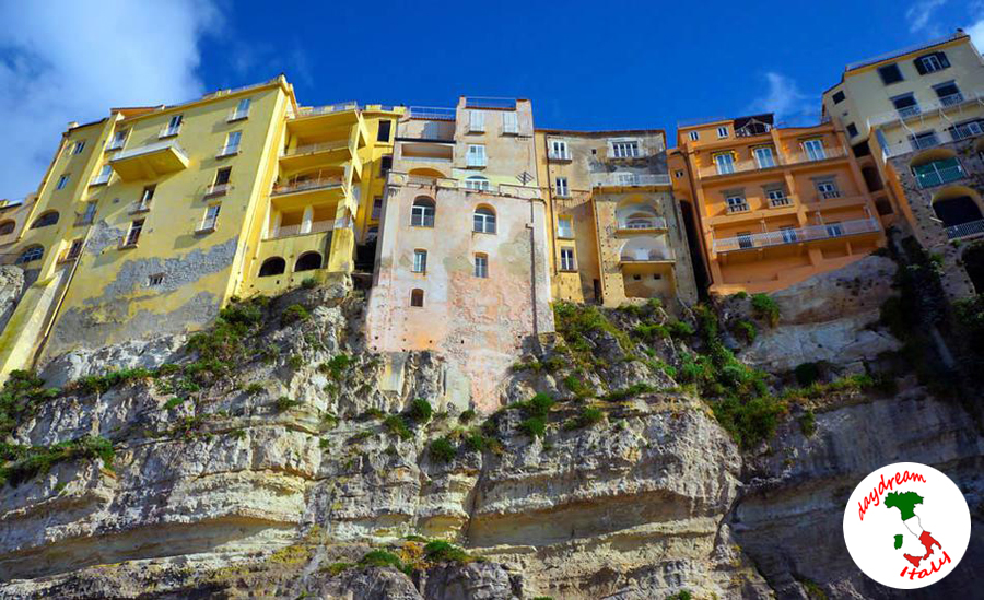 tropea buildings tower over the rock cliff